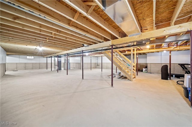 basement with heating unit and water heater