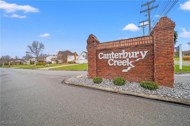 view of community sign