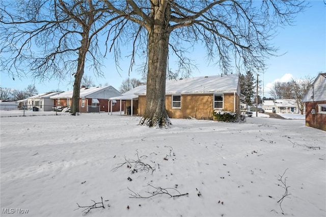 view of snow covered property