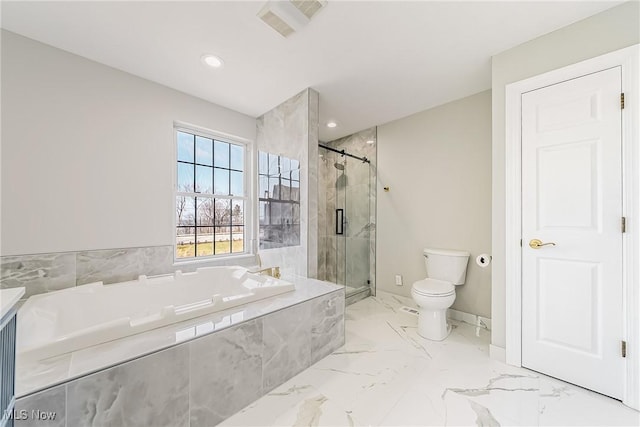 bathroom featuring toilet and shower with separate bathtub