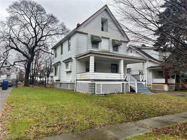 view of front facade featuring a front yard and a porch