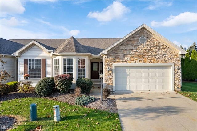 ranch-style house featuring a garage