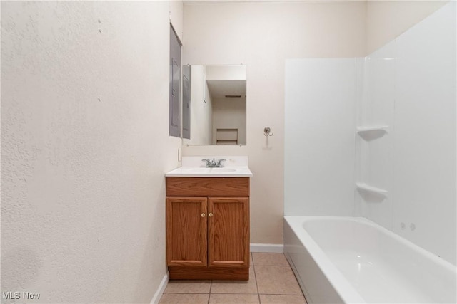 bathroom with tile patterned flooring and vanity