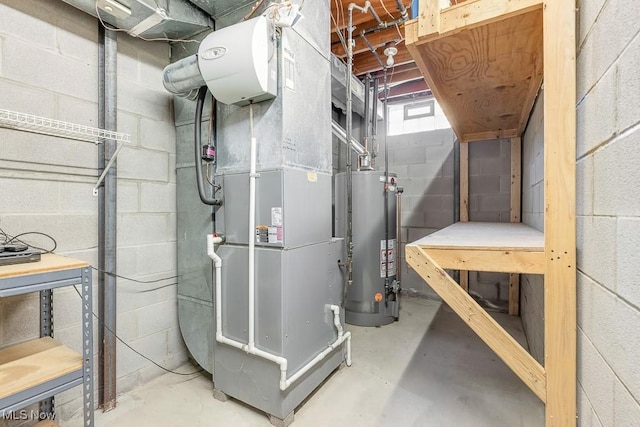 utility room featuring heating unit and water heater