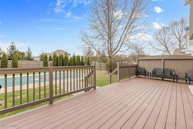 wooden terrace with a view of the beach