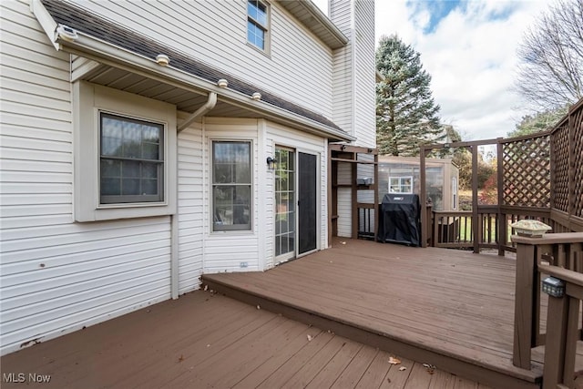 wooden deck with grilling area