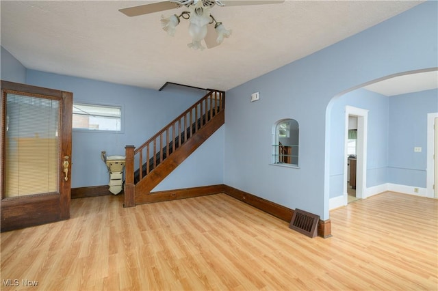 interior space featuring ceiling fan and light hardwood / wood-style floors