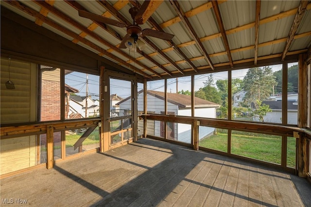 sunroom / solarium featuring vaulted ceiling and ceiling fan