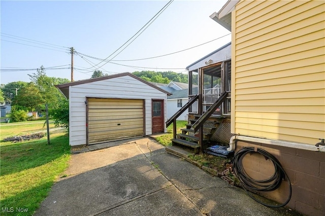 garage with a yard