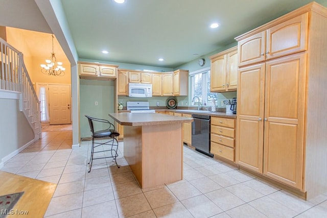 kitchen with a center island, a notable chandelier, white appliances, a kitchen bar, and light tile patterned flooring