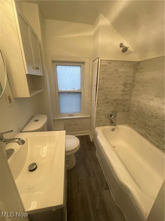 full bathroom with sink, toilet, shower / bath combination, and hardwood / wood-style flooring