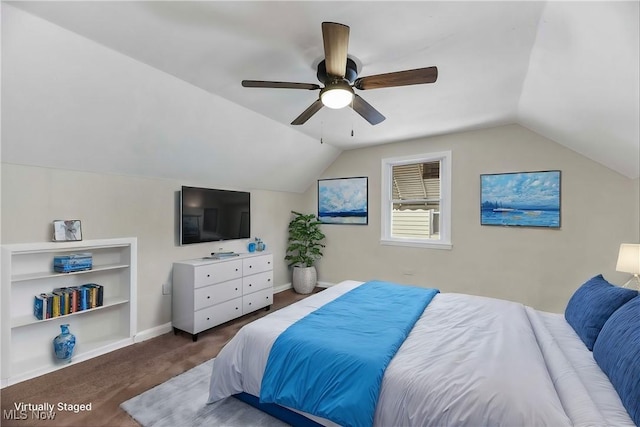 bedroom with carpet flooring, ceiling fan, and lofted ceiling