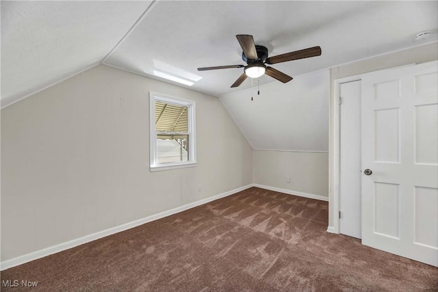 bonus room featuring ceiling fan, carpet, and lofted ceiling