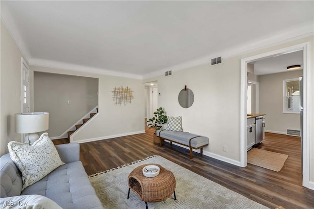 living room featuring dark wood-type flooring