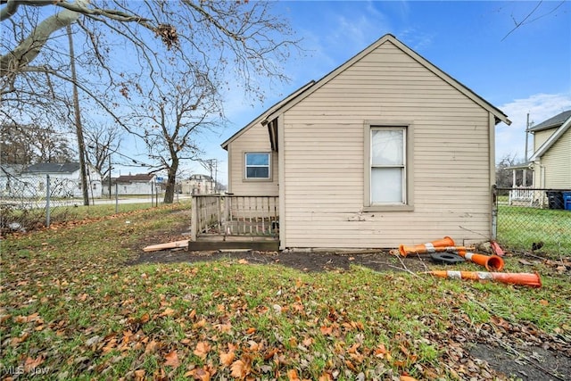 view of property exterior featuring a deck