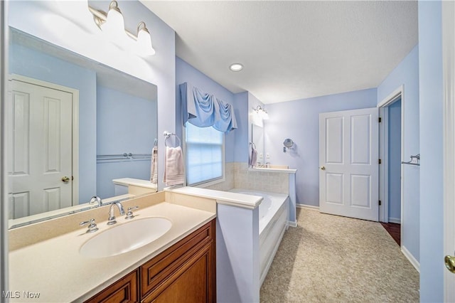 bathroom featuring a bathtub and vanity