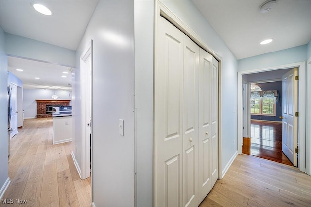 hall featuring light hardwood / wood-style flooring