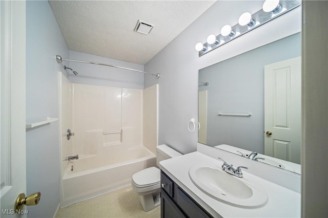 full bathroom with vanity, a textured ceiling, toilet, and tub / shower combination