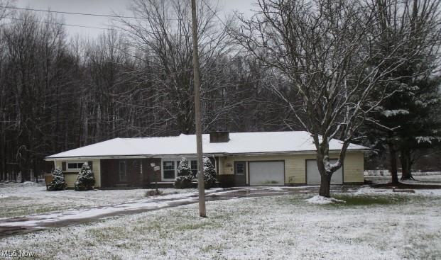 ranch-style house with a garage