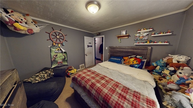 bedroom featuring carpet, a textured ceiling, and ornamental molding