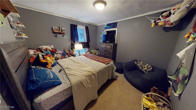 bedroom featuring carpet, a textured ceiling, and ornamental molding