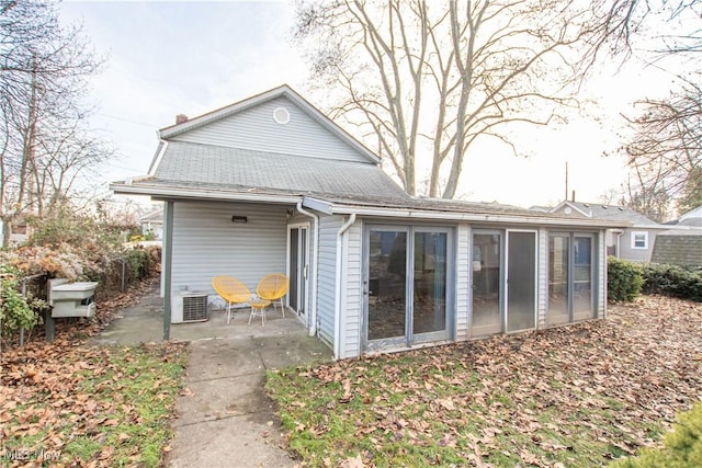 back of property featuring a patio area