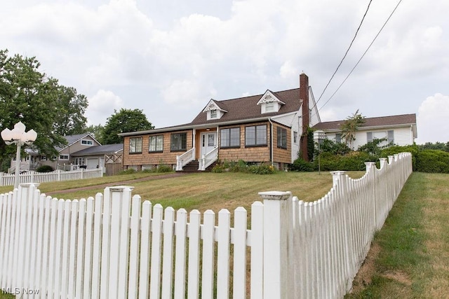 view of front of home with a front yard