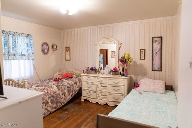 bedroom with dark wood-type flooring