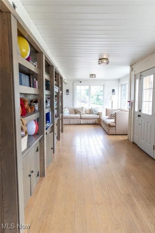 living area with light hardwood / wood-style flooring