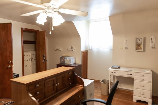 interior space with hardwood / wood-style flooring and ceiling fan