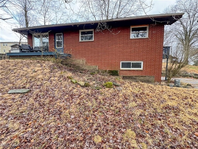 exterior space featuring a wooden deck