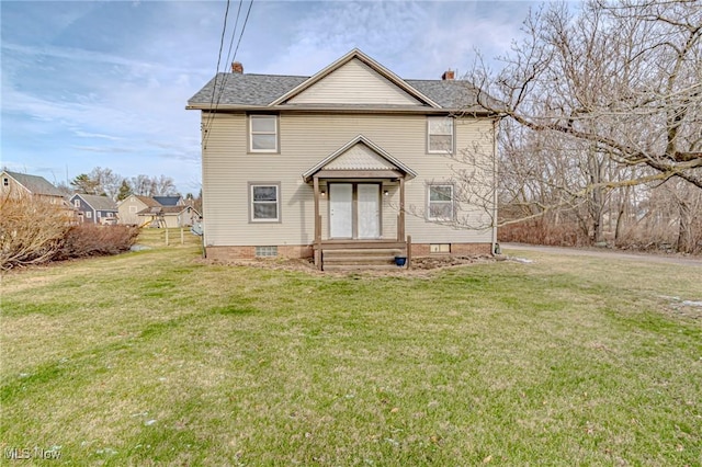 view of property featuring a front yard