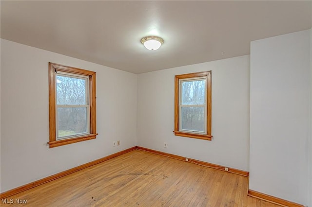 empty room featuring light hardwood / wood-style floors