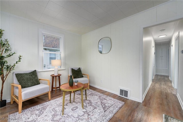 living area featuring hardwood / wood-style floors