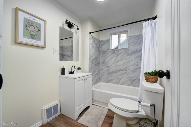 full bathroom with wood-type flooring, toilet, vanity, and shower / bath combination with curtain