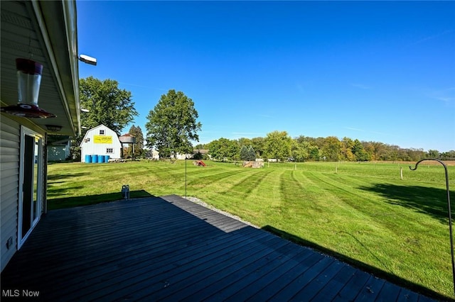 view of yard featuring a deck