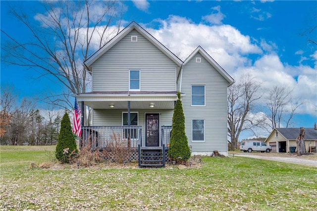 view of front property featuring a porch and a front lawn