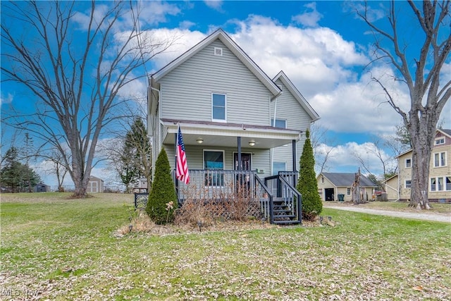 view of front of house with a porch and a front lawn