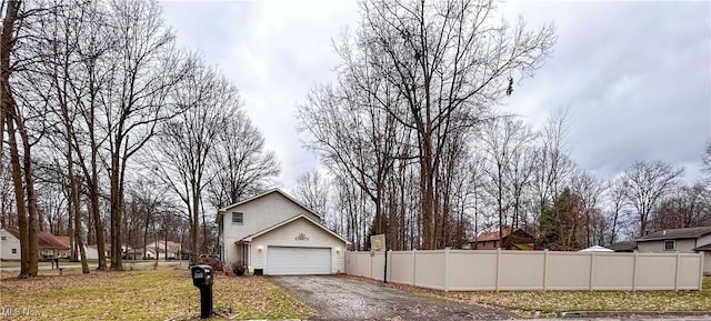 view of home's exterior with a garage