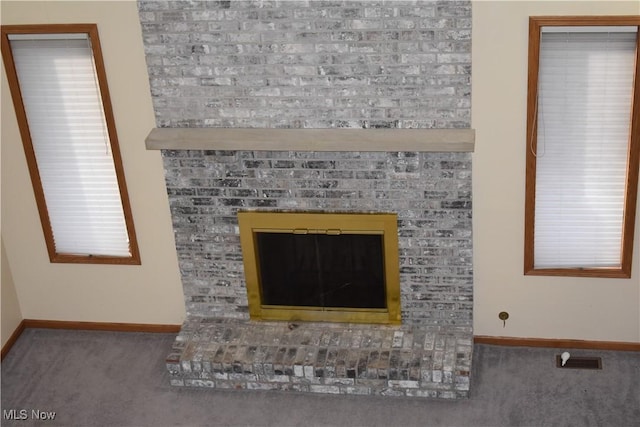 interior details featuring carpet flooring