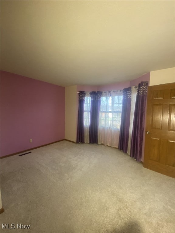 view of carpeted spare room