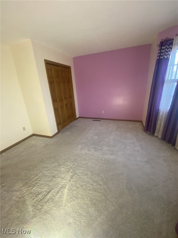 view of carpeted empty room