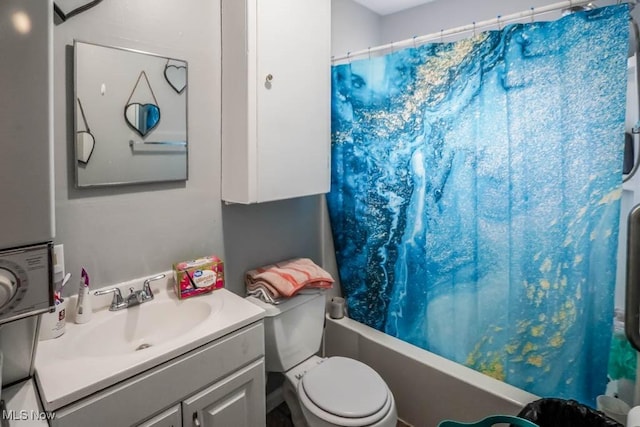 full bathroom with vanity, shower / bath combination with curtain, and toilet