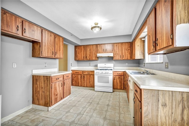 kitchen with sink and white appliances