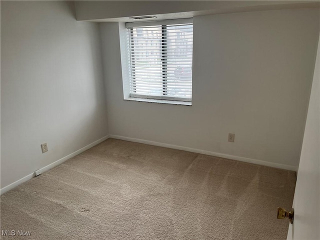 empty room with carpet floors