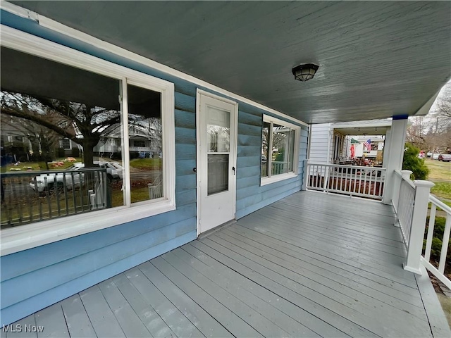 deck featuring covered porch