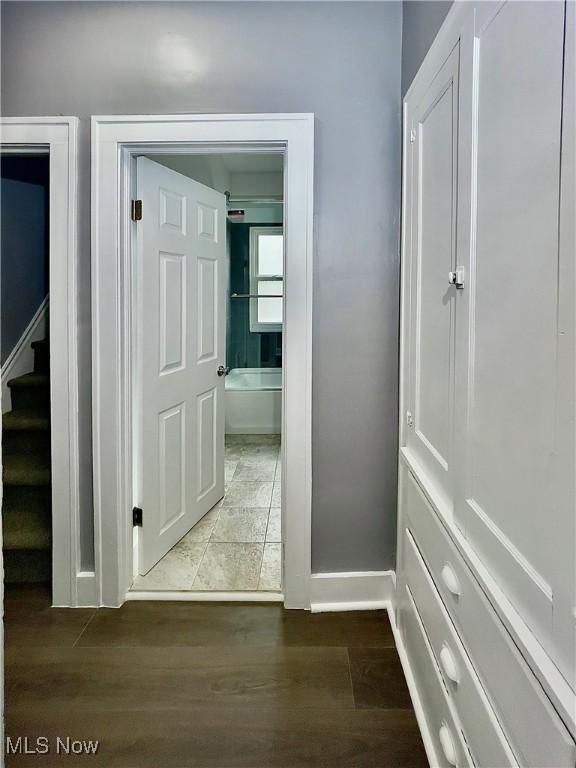 hallway featuring hardwood / wood-style floors