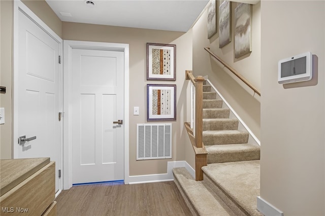 entrance foyer with hardwood / wood-style flooring