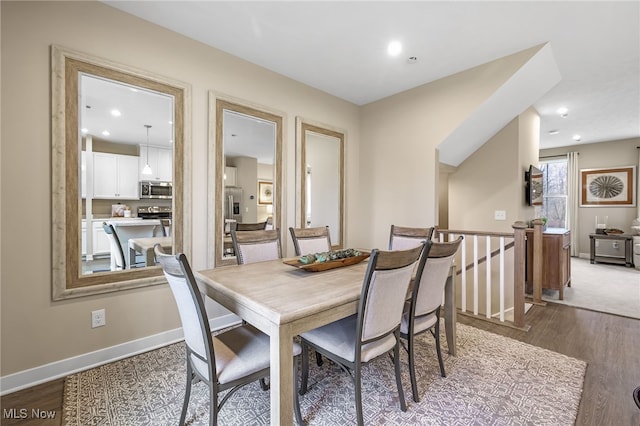 dining room featuring hardwood / wood-style flooring