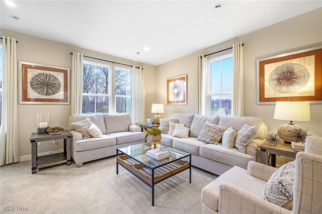 living room featuring light colored carpet